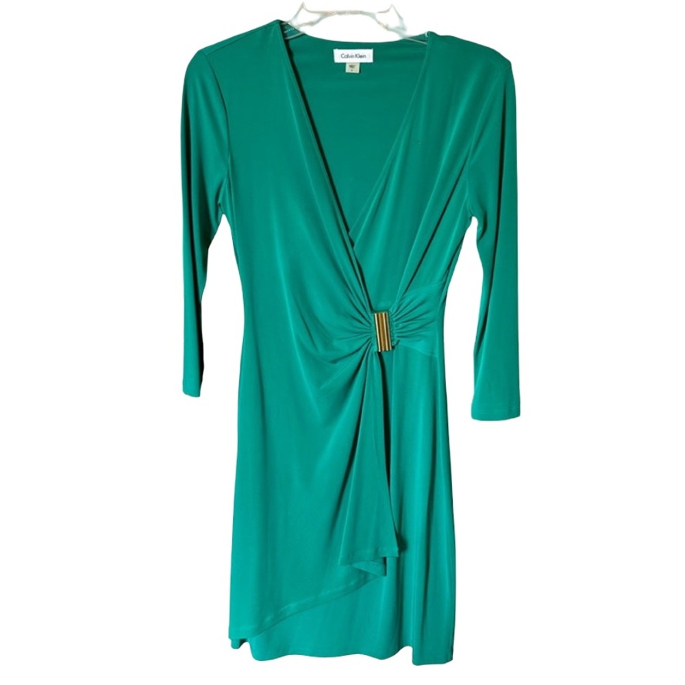 Calvin Klein green fitted dress with gold accent at waste